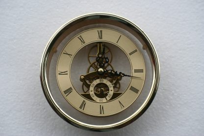 149mm flanged Skeleton Clock in Brass.