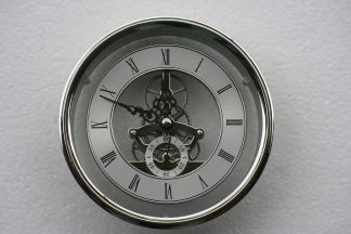 149mm flanged Skeleton Clock in Silver.